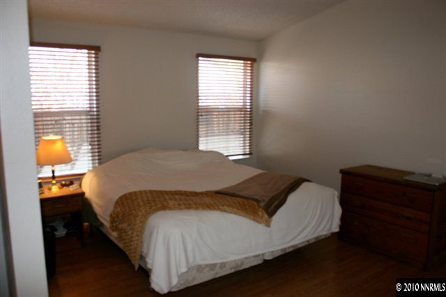 6330 Park Place Reno, NV 89523 - Photo 5 of 6 a bed sitting in a bedroom next to a window