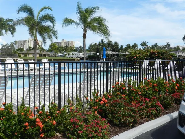 a table and chairs in front of a window