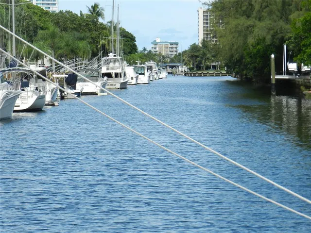 a view of a car parked in front of a house