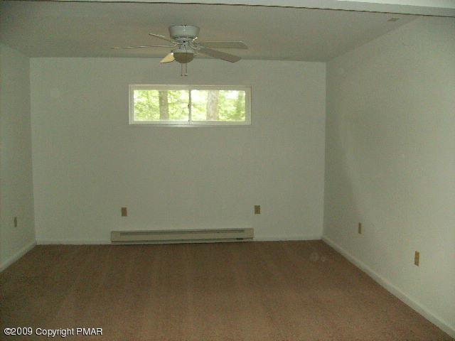 117 Decker Road Bushkill, PA 18324 - Photo 8 of 10 an empty room with a window