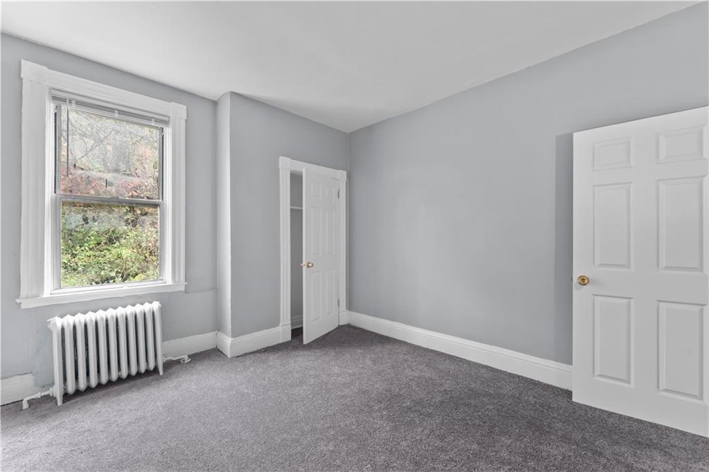 147 Moultrie Street Pittsburgh, PA 15219 - Photo 21 of 30 a view of an empty room with a window