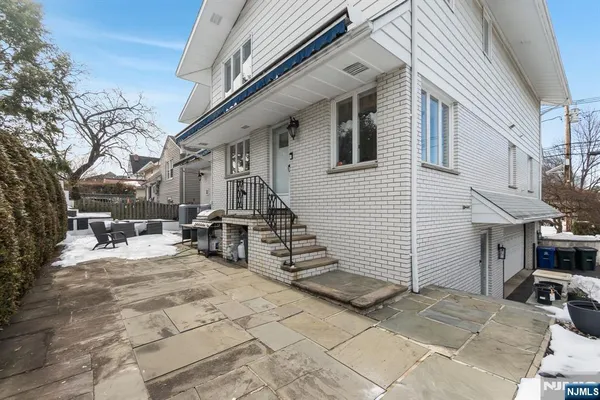 a view of a building with sitting area