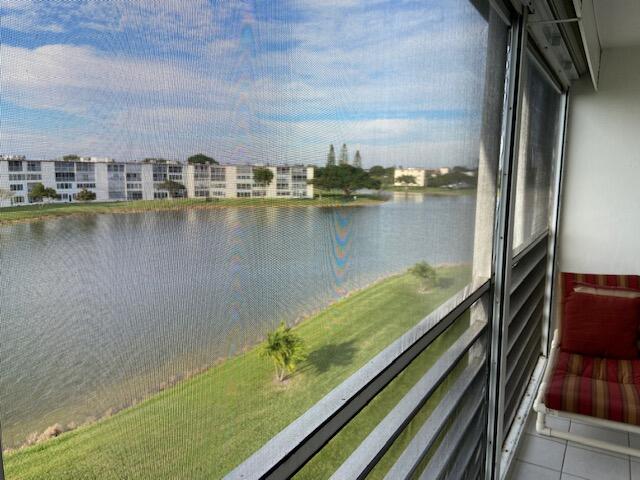 a view of a lake from a balcony