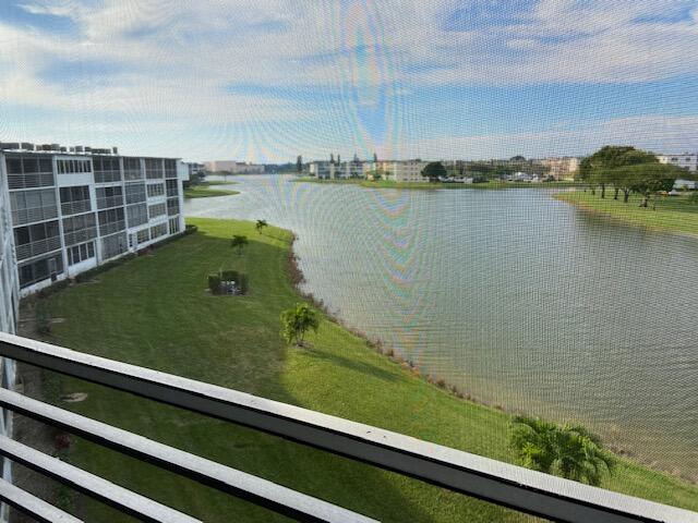 4042 Exeter C Boca Raton, FL 33434 - Photo 12 of 13 a view of a lake from a balcony