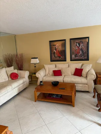 a living room with furniture and a couch