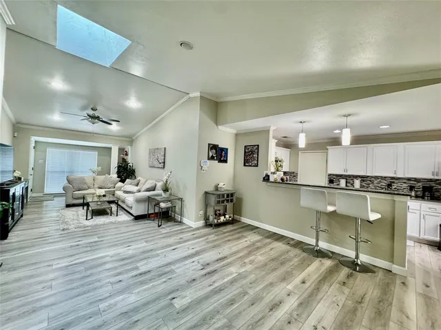 a living room with furniture and a table