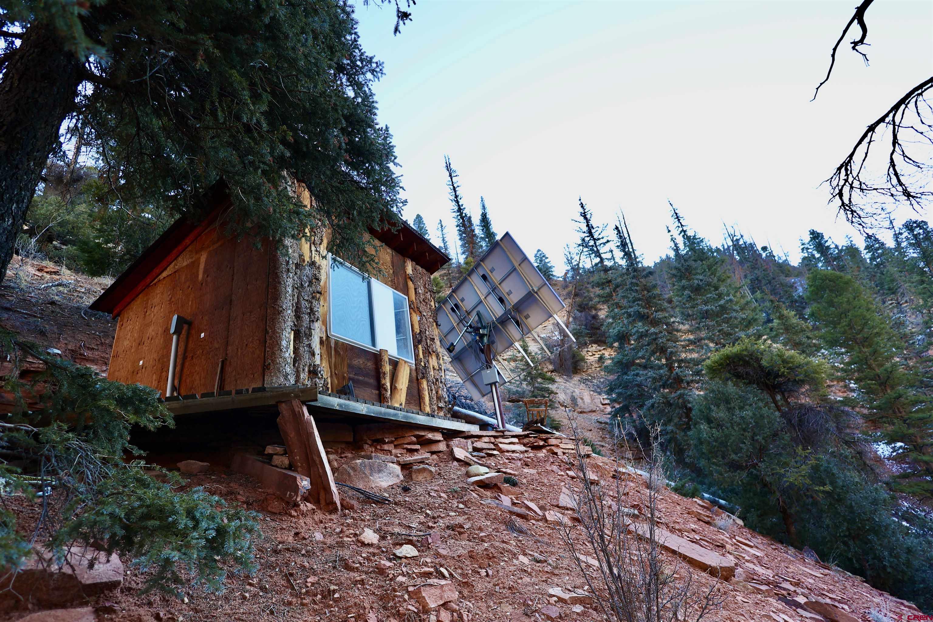 Silver Pick Road Telluride, CO 81435 - Photo 18 of 21 a house view with a backyard space