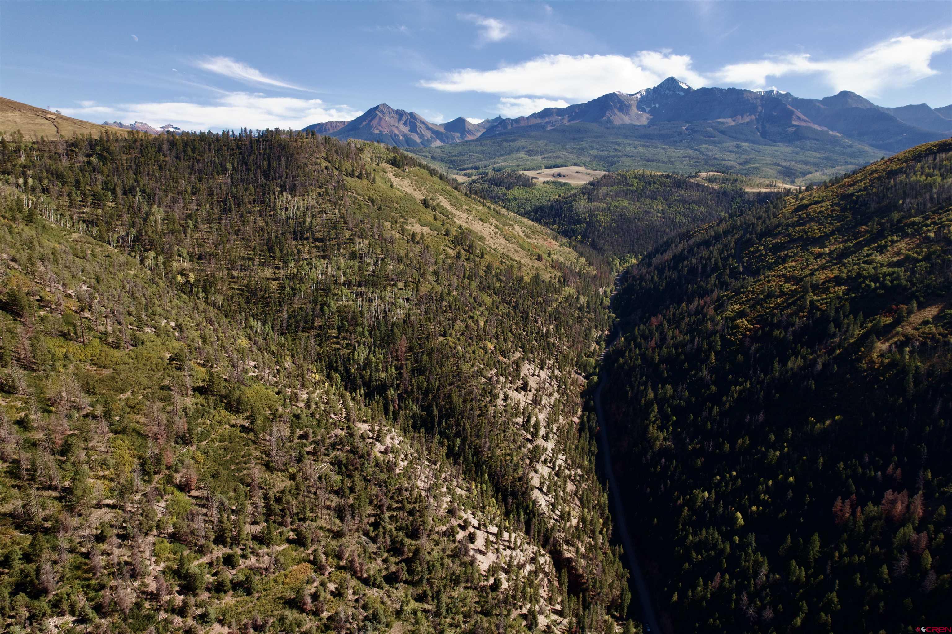 Silver Pick Road Telluride, CO 81435 - Photo 3 of 21 a view of a house with a mountain and a mountain in the background