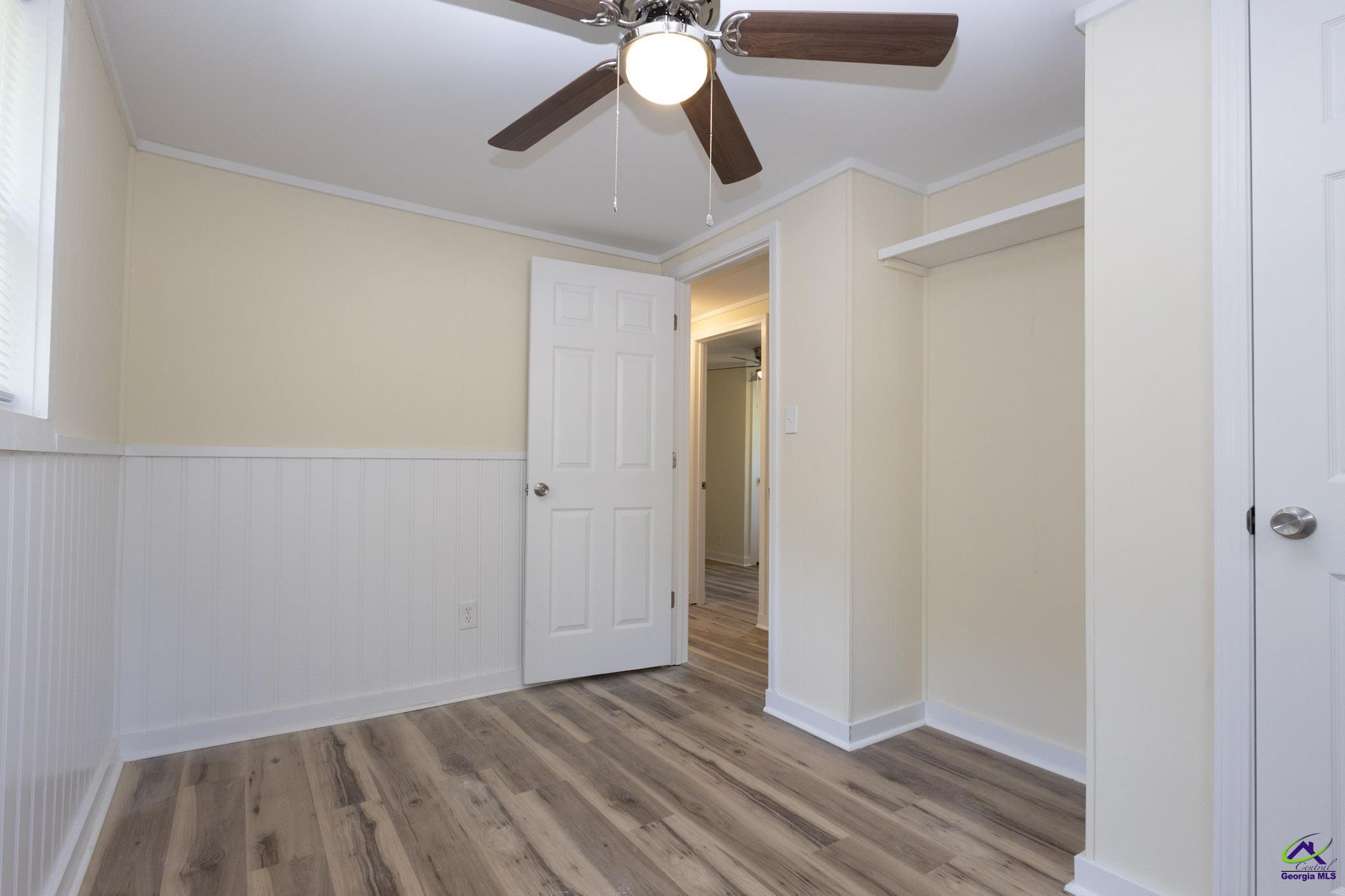156 Churchwell Road Cochran, GA 31014 - Photo 15 of 20 wooden floor in an empty room