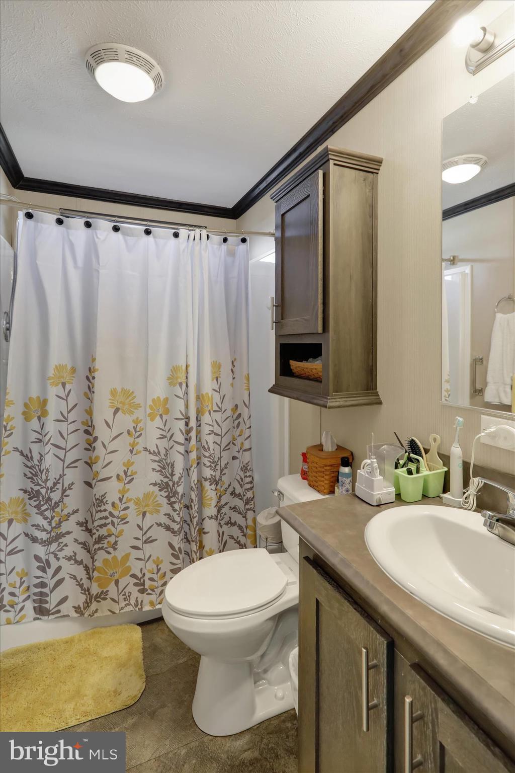 38 Keystone Road Reading, PA 19606 - Photo 16 of 22 a bathroom with a sink toilet and shower