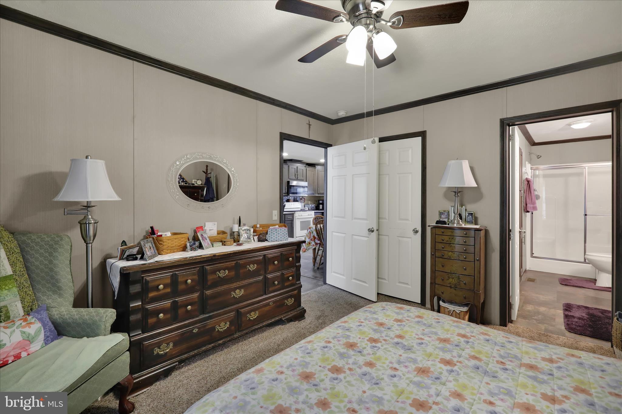 38 Keystone Road Reading, PA 19606 - Photo 18 of 22 a bedroom with a bed and a chandelier