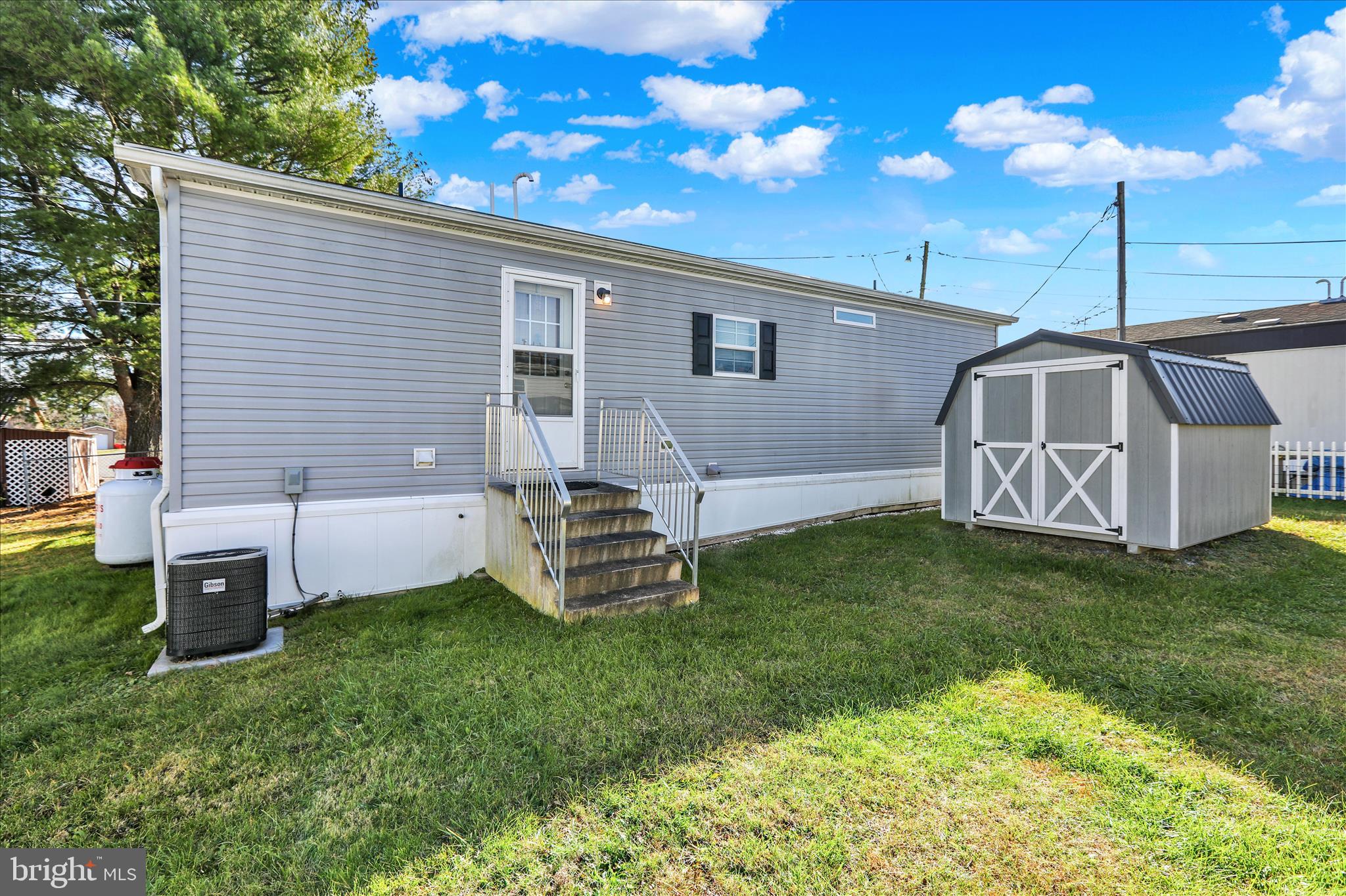 38 Keystone Road Reading, PA 19606 - Photo 22 of 22 a backyard of a house with table and chairs