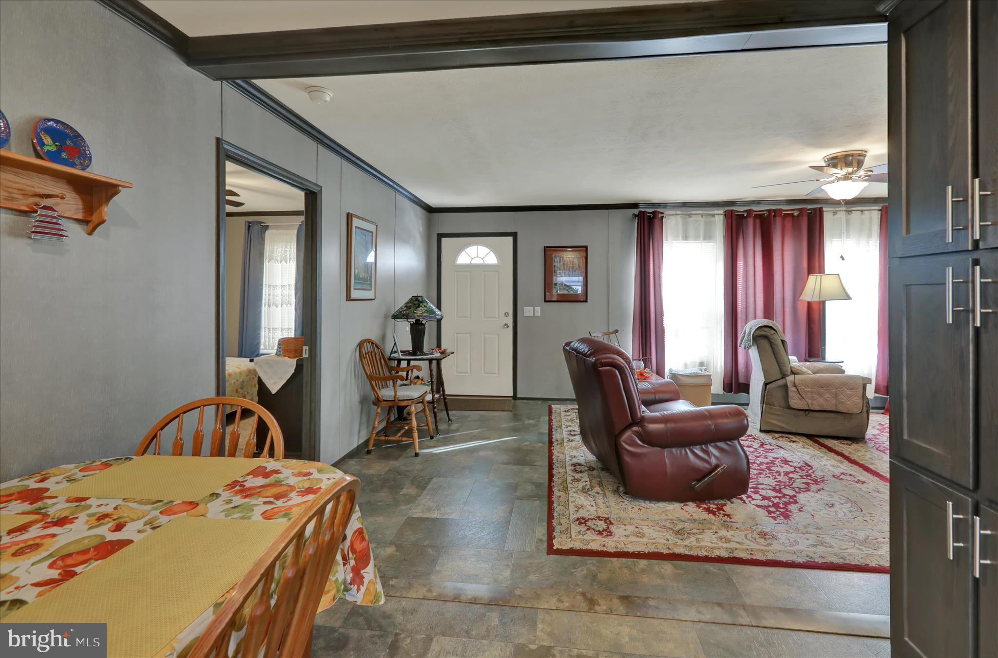 38 Keystone Road Reading, PA 19606 - Photo 7 of 22 a living room with furniture a rug and a window