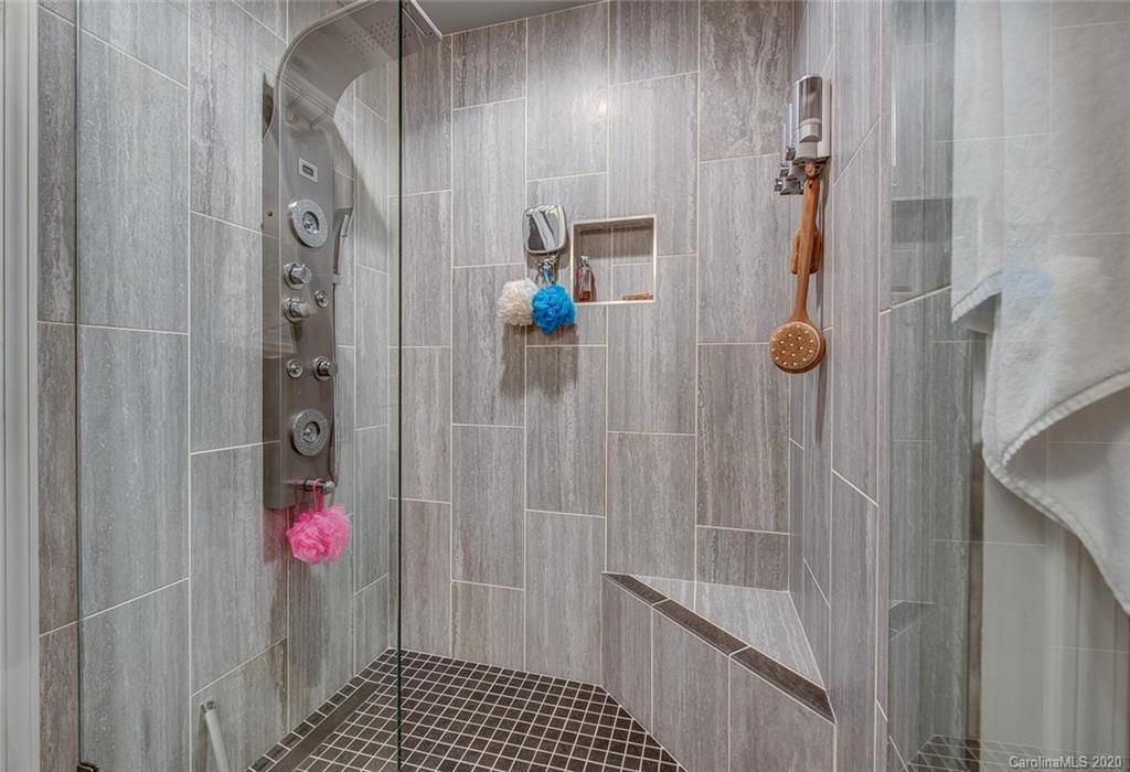 220 Falling Ridge, Unit 149 Mount Holly, NC 28012 - Photo 14 of 19 a bathroom with a shower