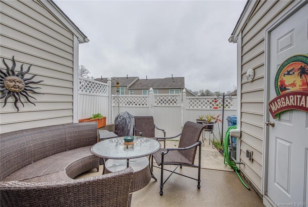 220 Falling Ridge, Unit 149 Mount Holly, NC 28012 - Photo 18 of 19 a view of terrace with seating area and barbeque oven