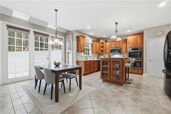 a view of a dining room kitchen and a window