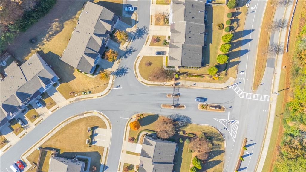 2420 Boxwalking Court Cumming, GA 30040 - Photo 41 of 42 a aerial view of a multi story residential apartment building with a lot of windows