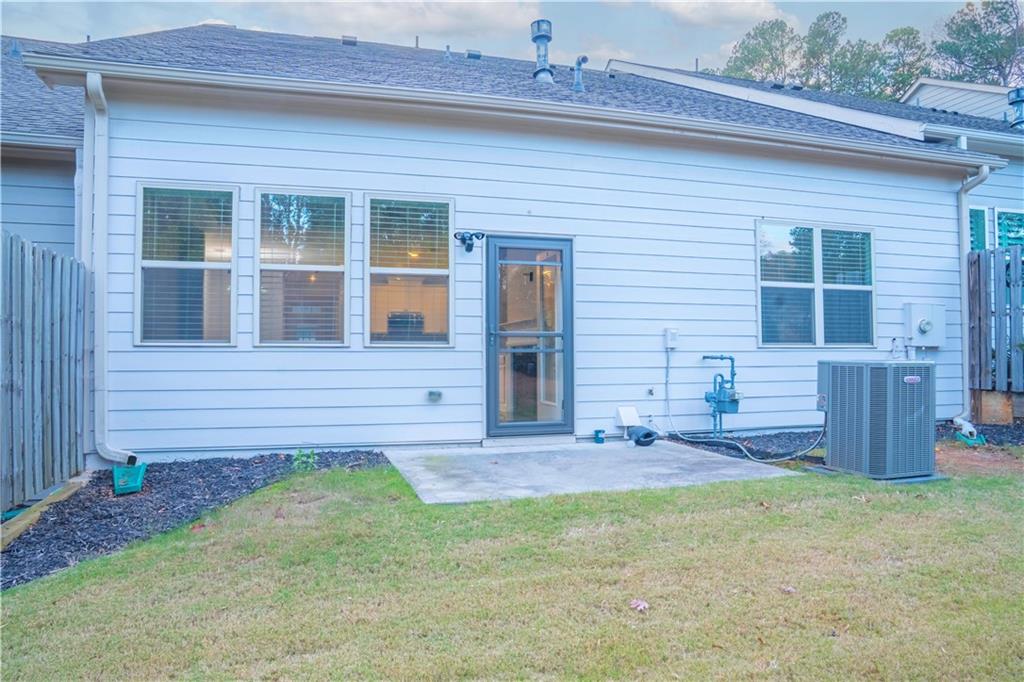 2420 Boxwalking Court Cumming, GA 30040 - Photo 10 of 42 a view of outdoor space and yard