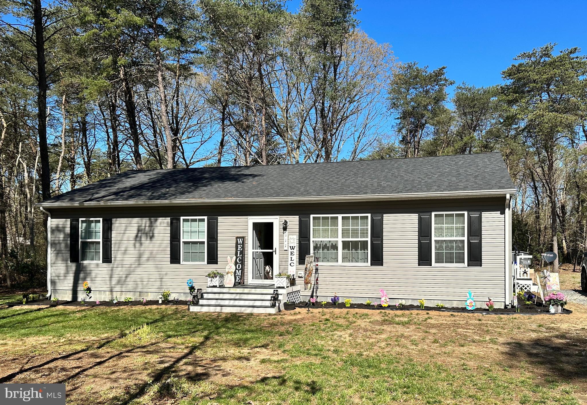 111 Cee Jay Road Chestertown, MD 21620 - Photo 1 of 38 a front view of a house with a garden
