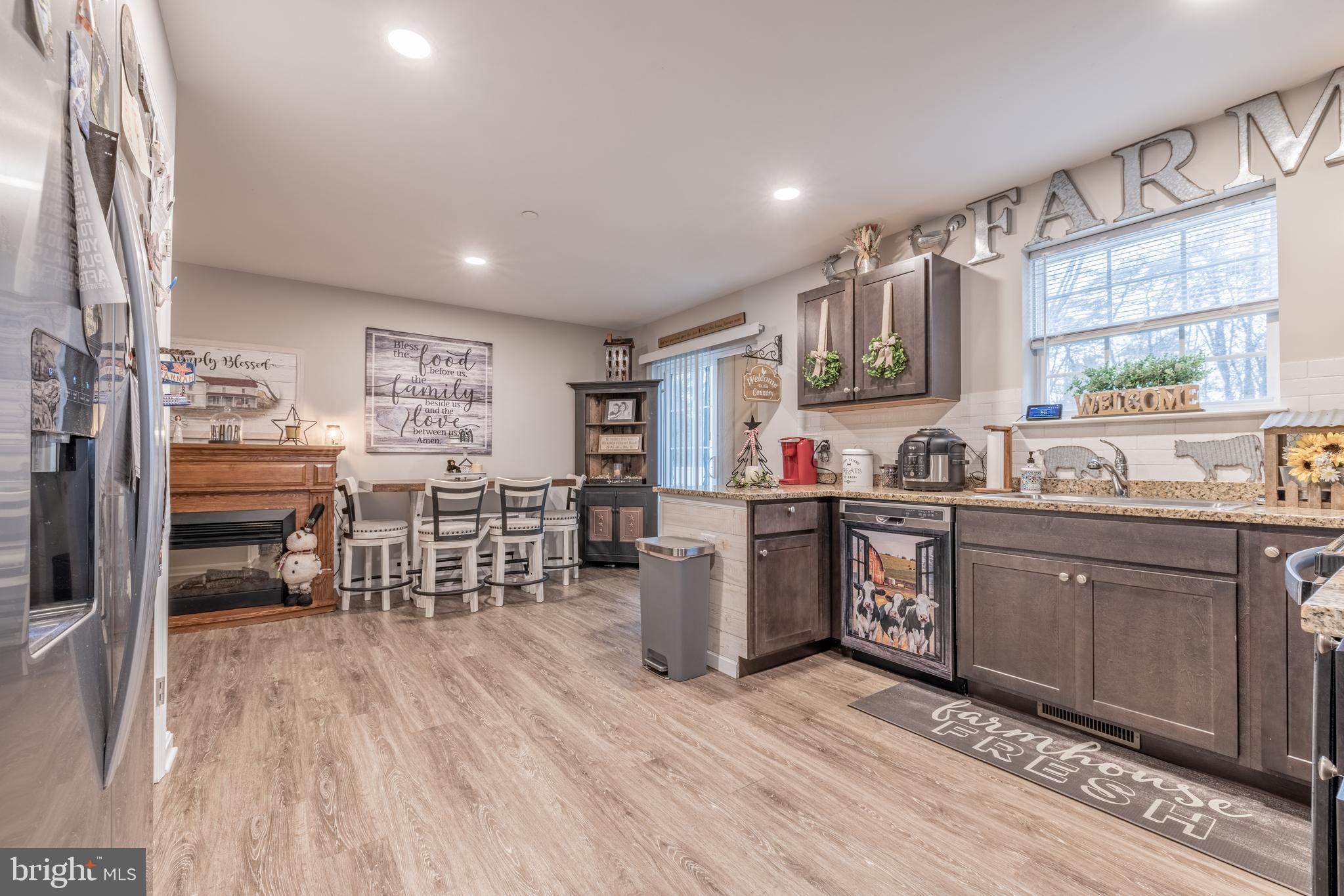 111 Cee Jay Road Chestertown, MD 21620 - Photo 11 of 38 a kitchen with lots of counter top space and painting on the wall