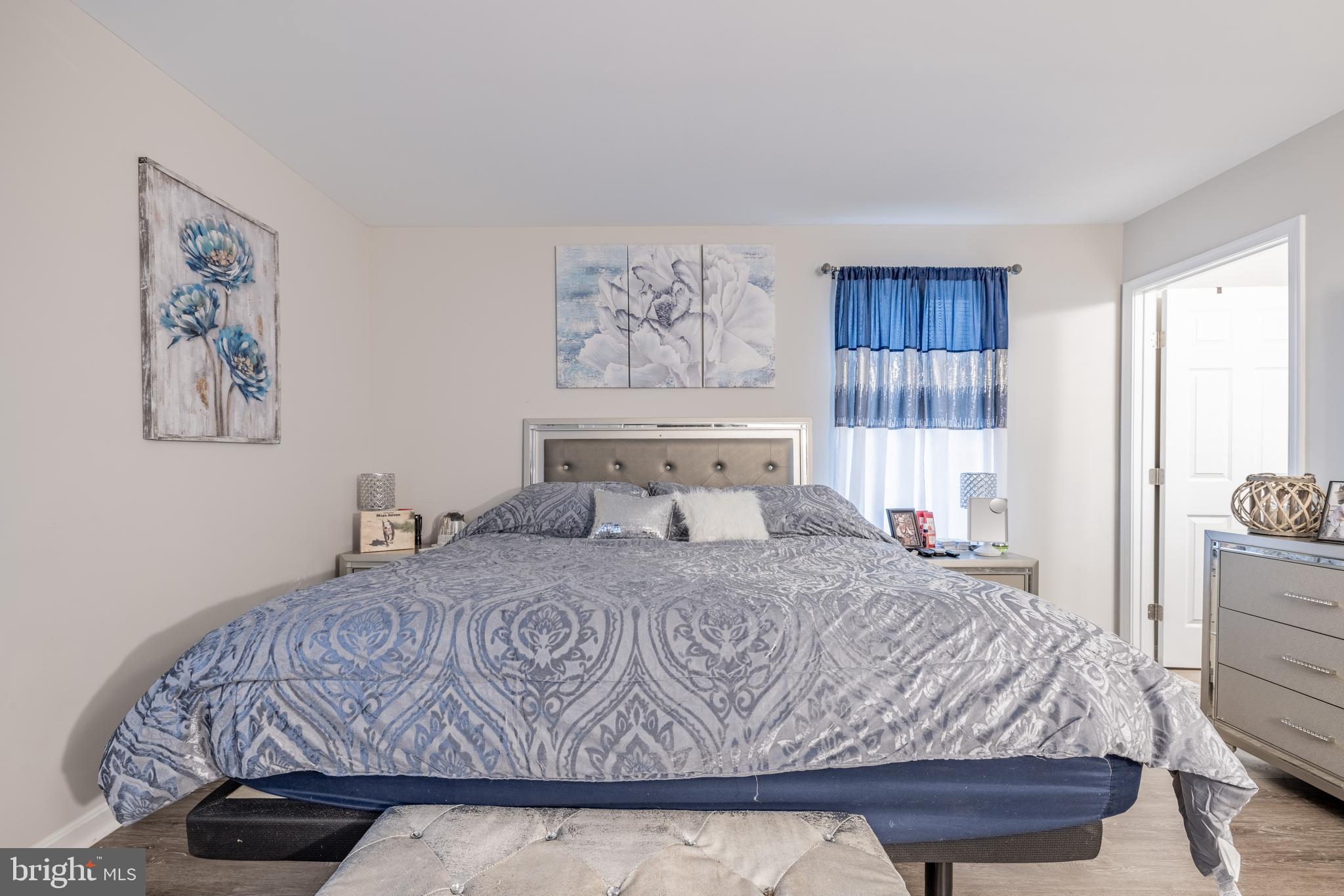 111 Cee Jay Road Chestertown, MD 21620 - Photo 19 of 38 a bedroom with a large bed and a window