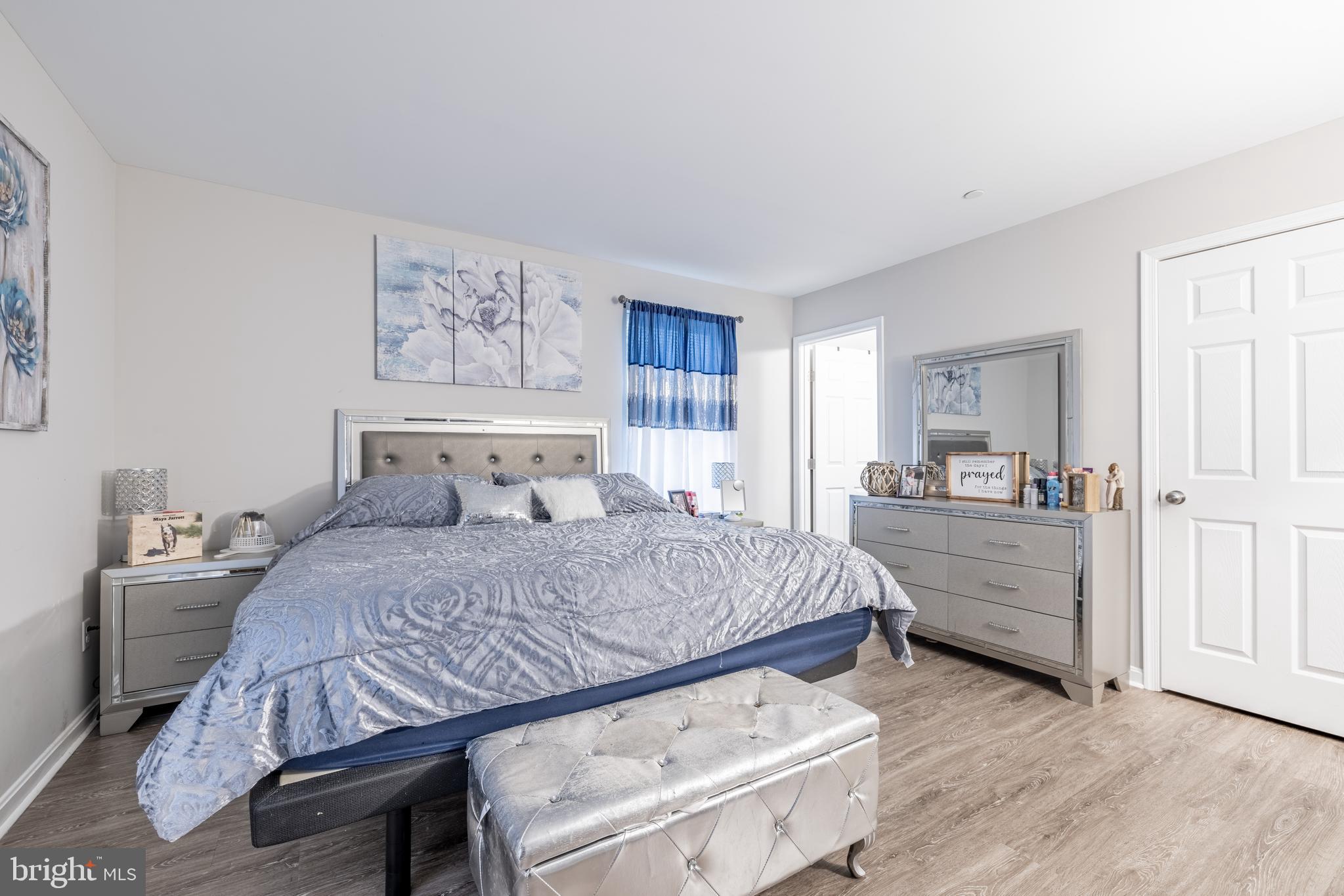 111 Cee Jay Road Chestertown, MD 21620 - Photo 20 of 38 a bedroom with a large bed and a couch