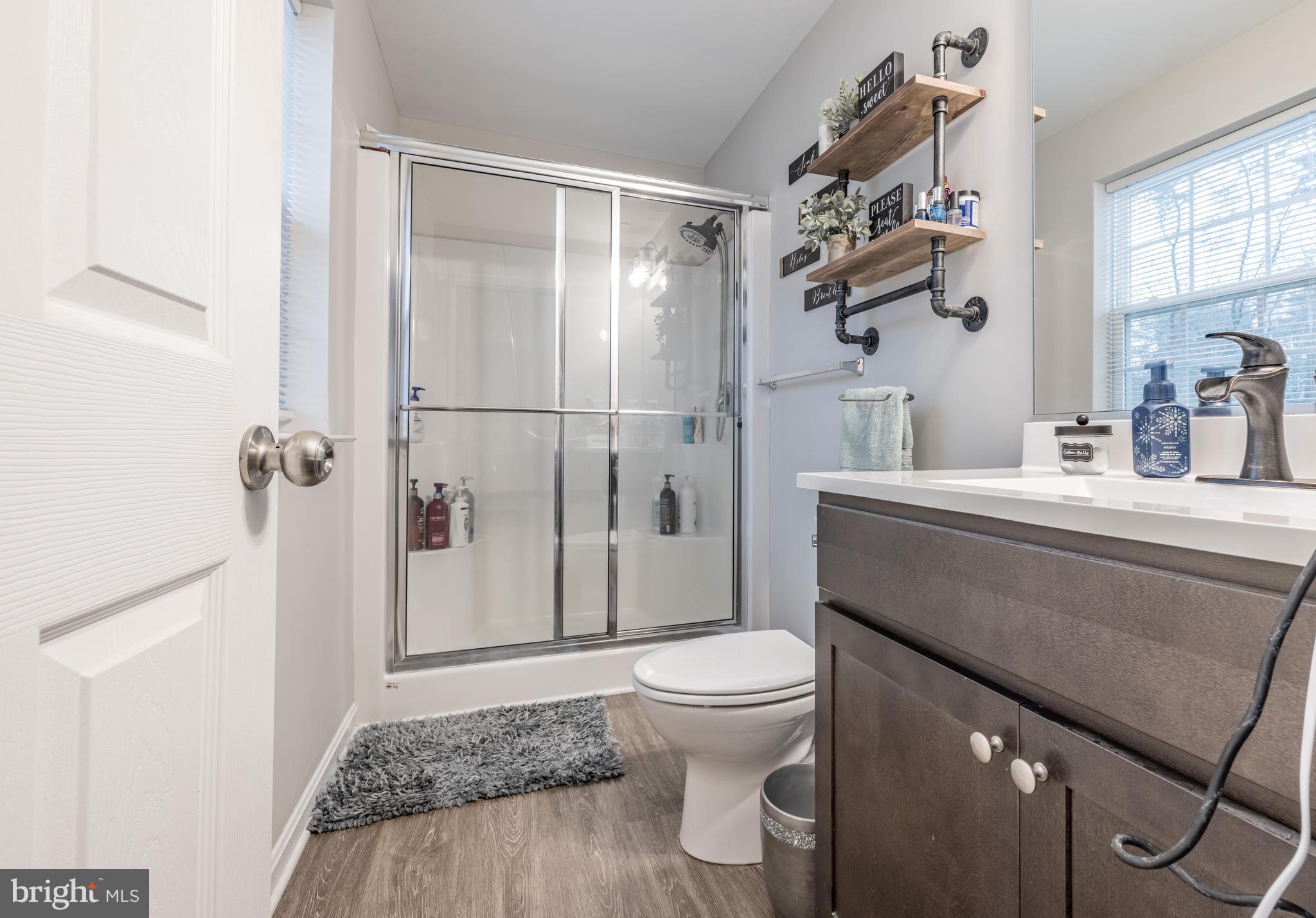 111 Cee Jay Road Chestertown, MD 21620 - Photo 22 of 38 a bathroom with a sink a toilet and shower