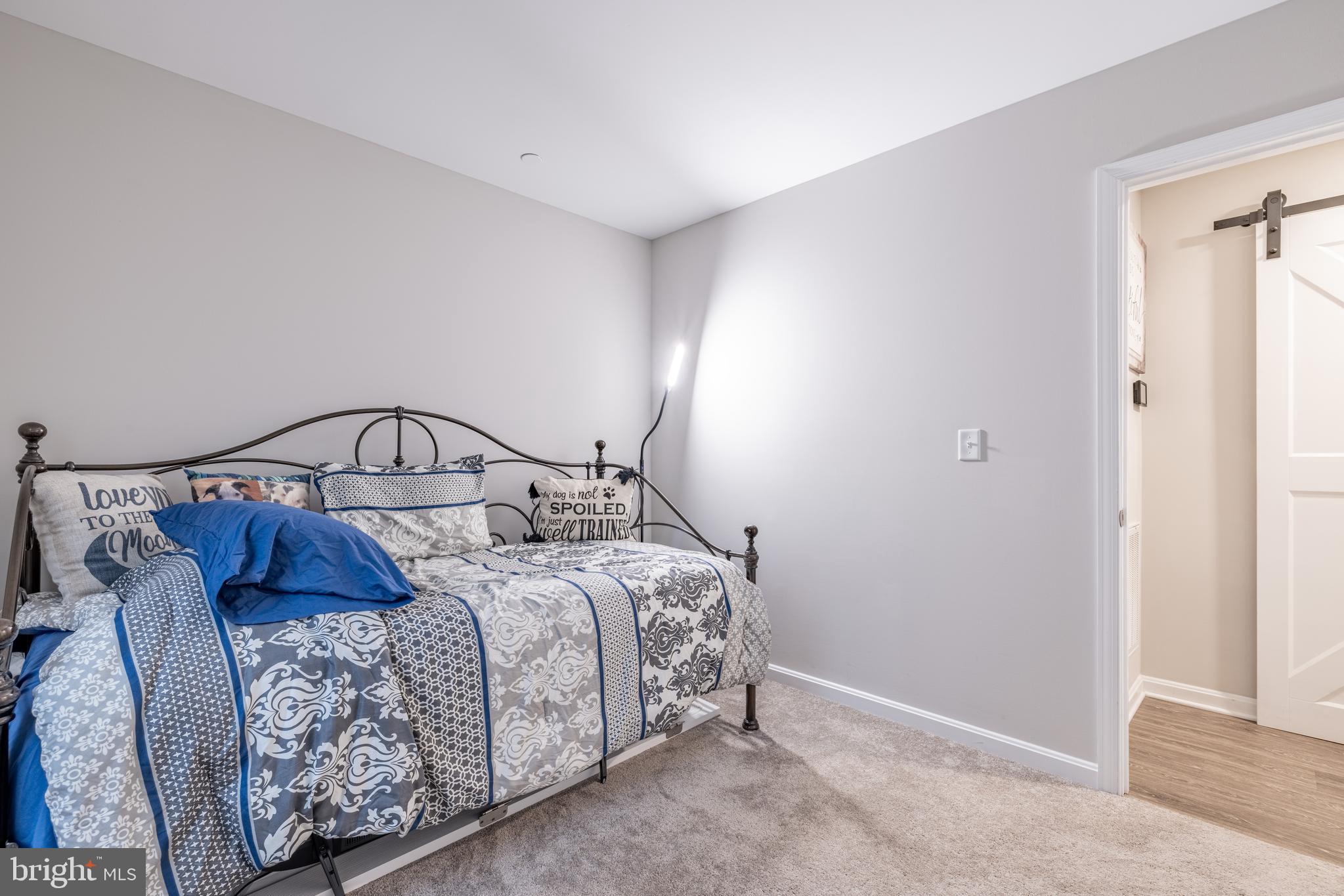 111 Cee Jay Road Chestertown, MD 21620 - Photo 28 of 38 a bedroom with a bed and a window