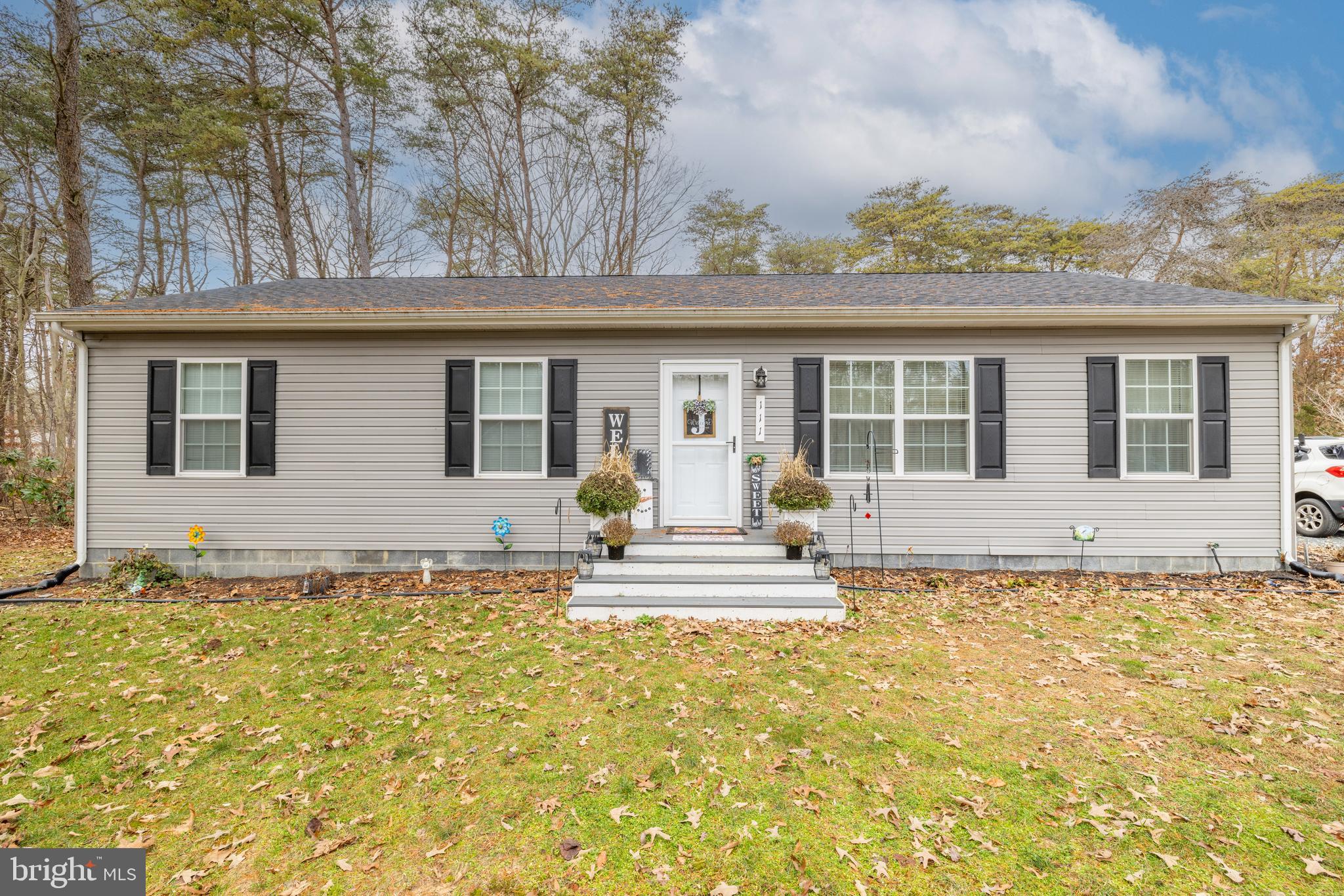111 Cee Jay Road Chestertown, MD 21620 - Photo 3 of 38 a front view of a house with a large window