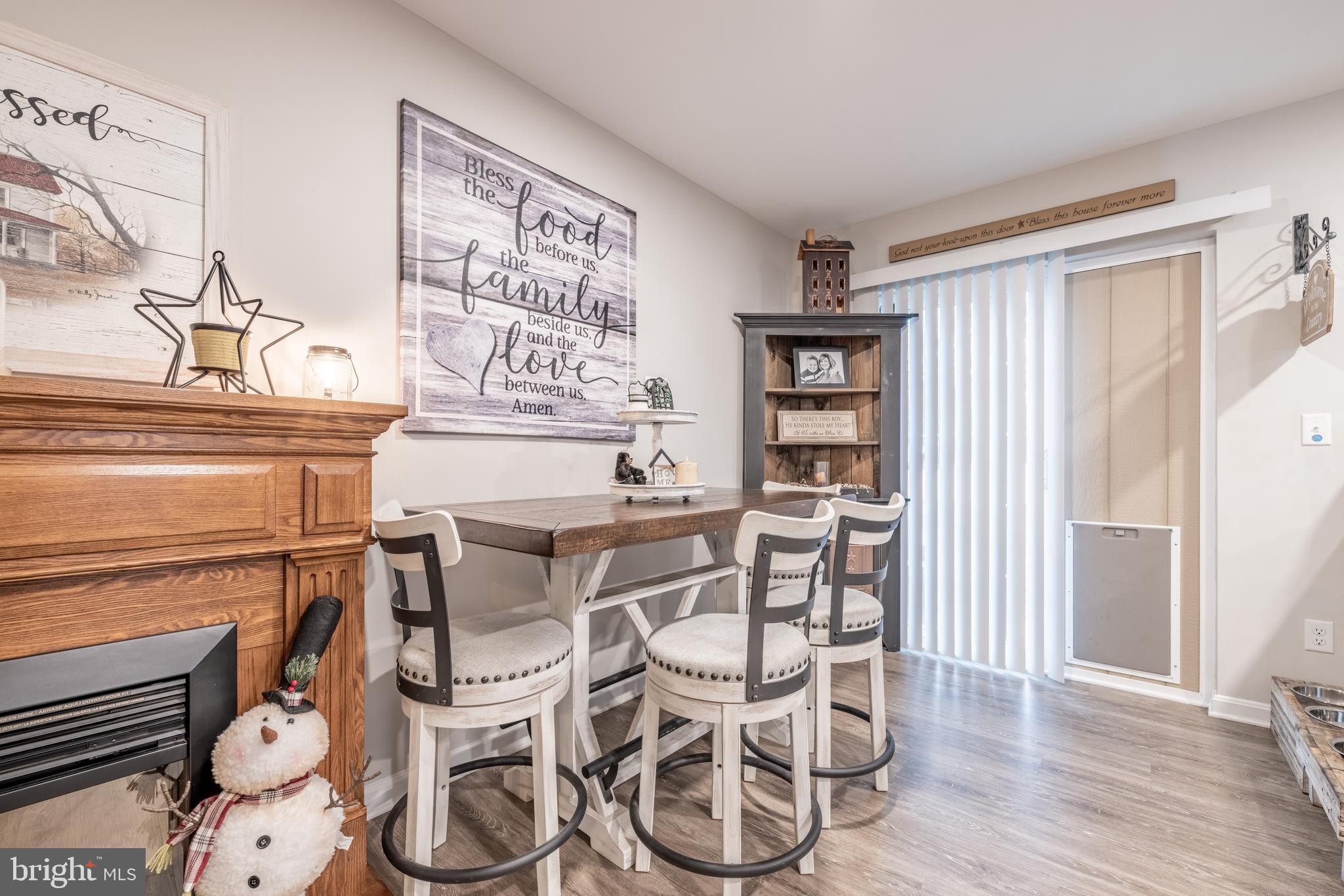 111 Cee Jay Road Chestertown, MD 21620 - Photo 9 of 38 a view of a dining room with furniture and wooden floor