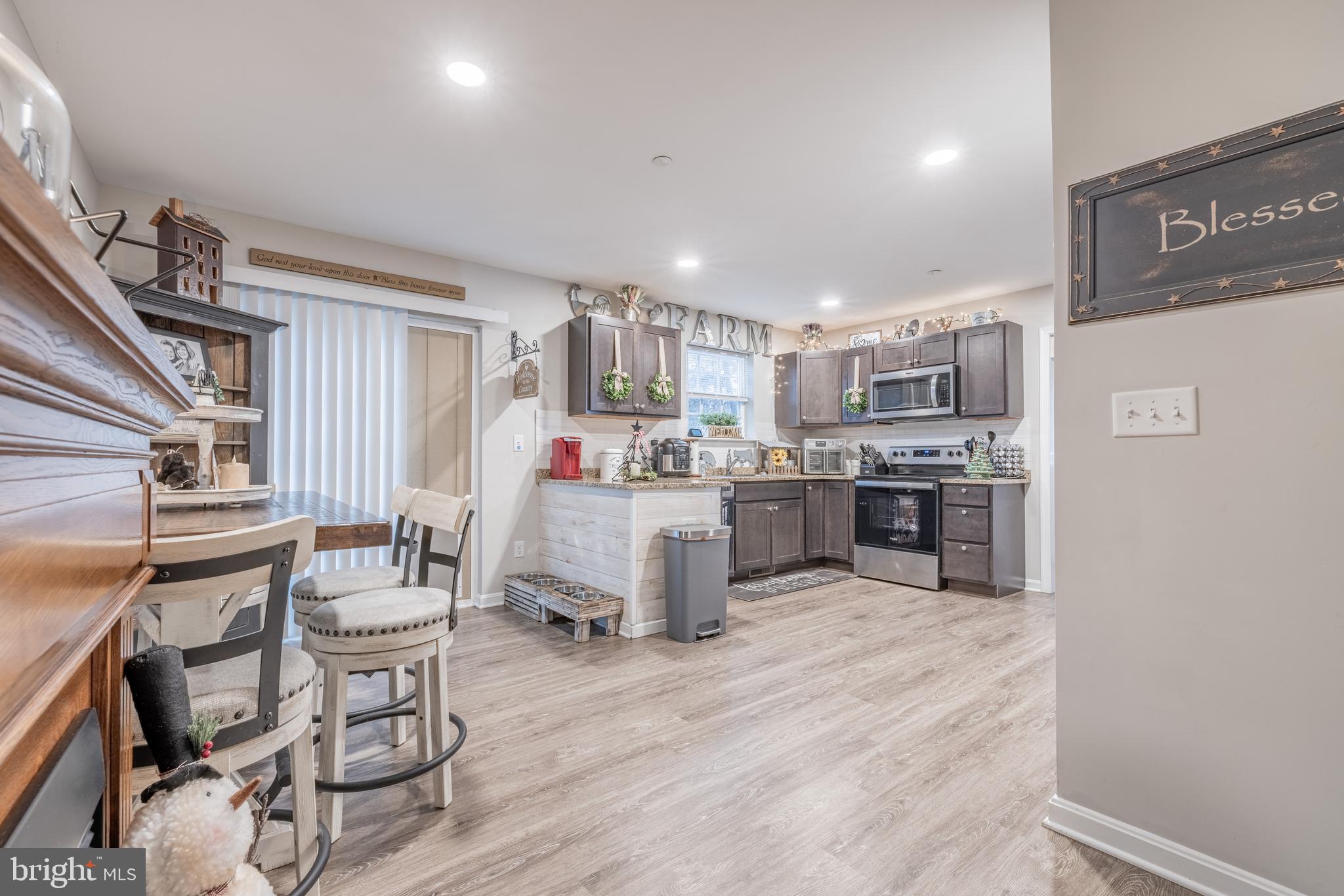 111 Cee Jay Road Chestertown, MD 21620 - Photo 10 of 38 a kitchen with a sink cabinets and wooden floor