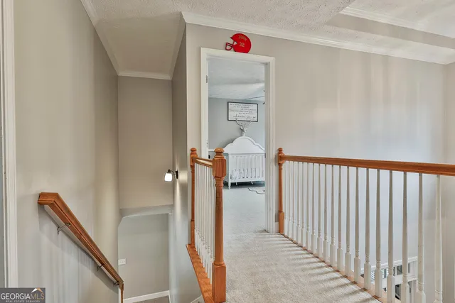 a spacious bathroom with a granite countertop sink and a mirror