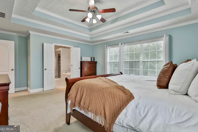 a view of livingroom with furniture and windows