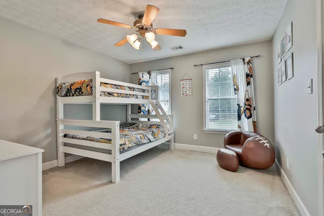 a room with furniture and window