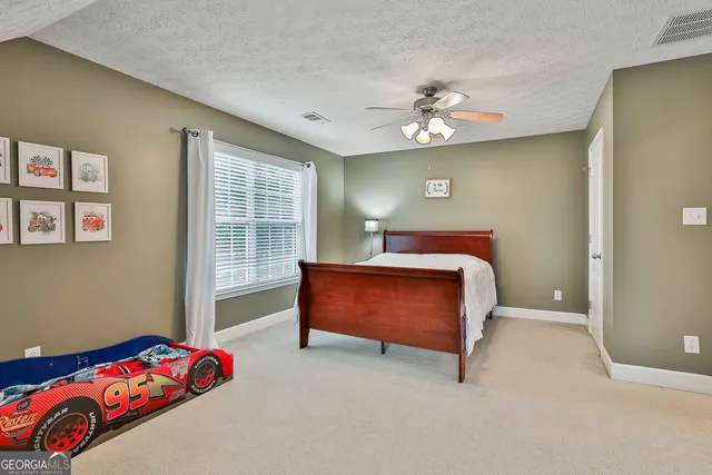 a view of a table and chairs in patio