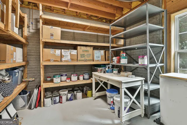 a view of a house with yard and a garden