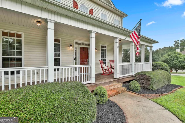 a house view with a garden space