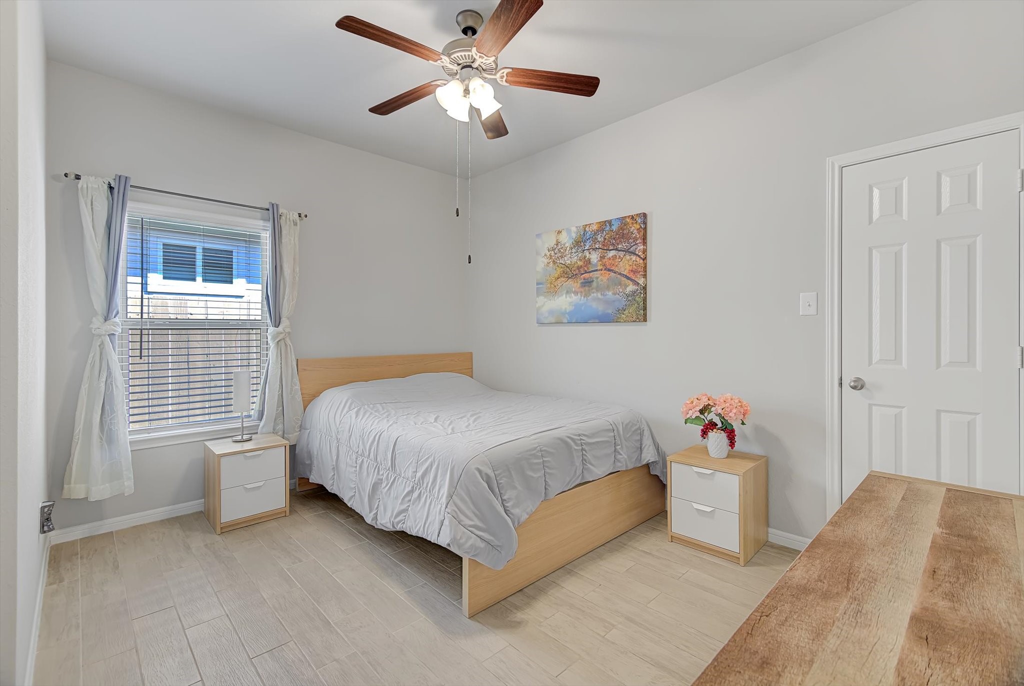 16514 Twinwalker Drive Houston, TX 77049 - Photo 24 of 35 a bedroom with a bed and a window