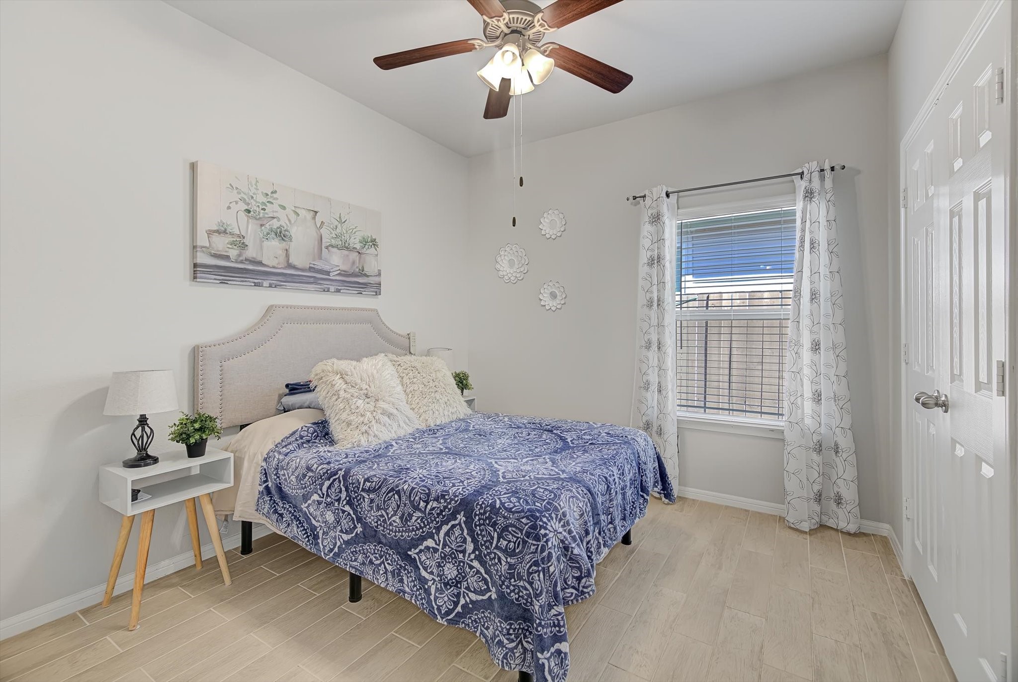 16514 Twinwalker Drive Houston, TX 77049 - Photo 26 of 35 a bedroom with bed and window