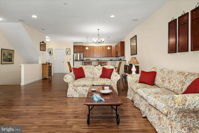 a view of a livingroom with furniture and a fireplace