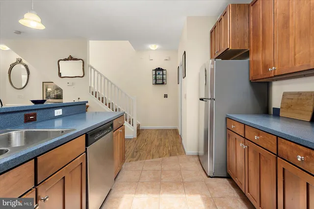 a living room with a bed furniture and a window