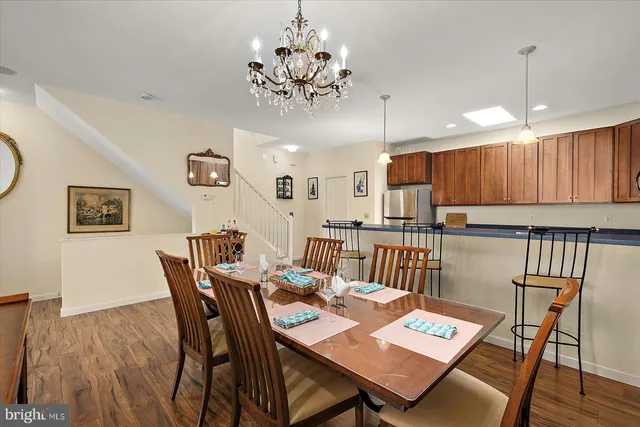 a bedroom with a bed couch and window