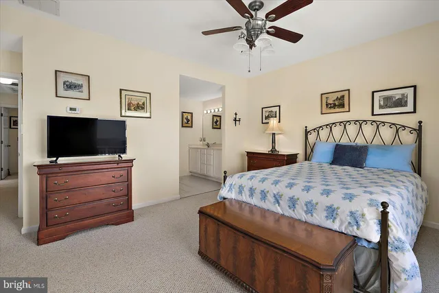 an aerial view of residential houses with yard and swimming pool