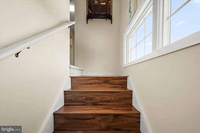 a view of livingroom with hardwood and furniture