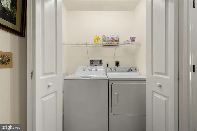 a view of a house with a yard from a porch