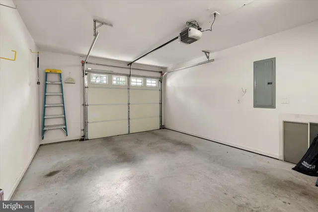 a view of a house with backyard and porch