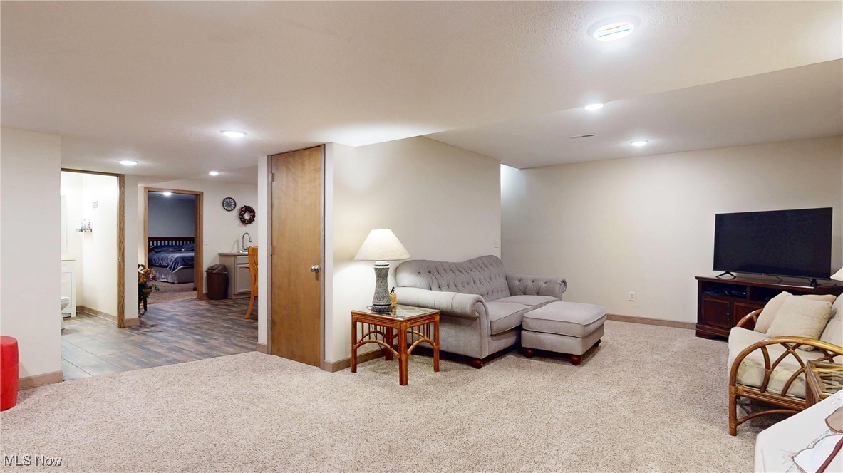 961 Industry Road Atwater, OH 44201 - Photo 28 of 50 Carpeted living area with recessed lighting and baseboards