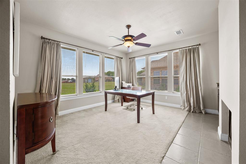 219 Mohundro Road Ferris, TX 75125 - Photo 20 of 40 a living room with furniture and a window