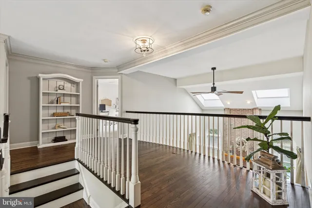 a view of entryway with wooden floor