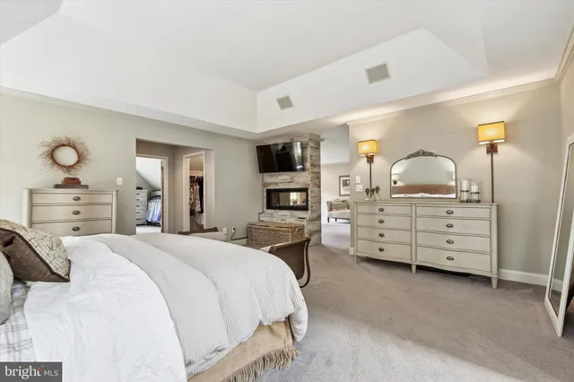 a bedroom with a bed and furniture